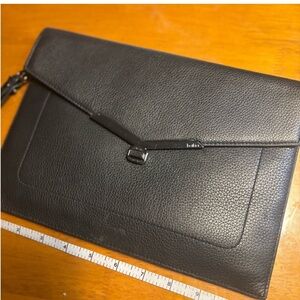 Elegant Black Leather Clutch.BOTKIER